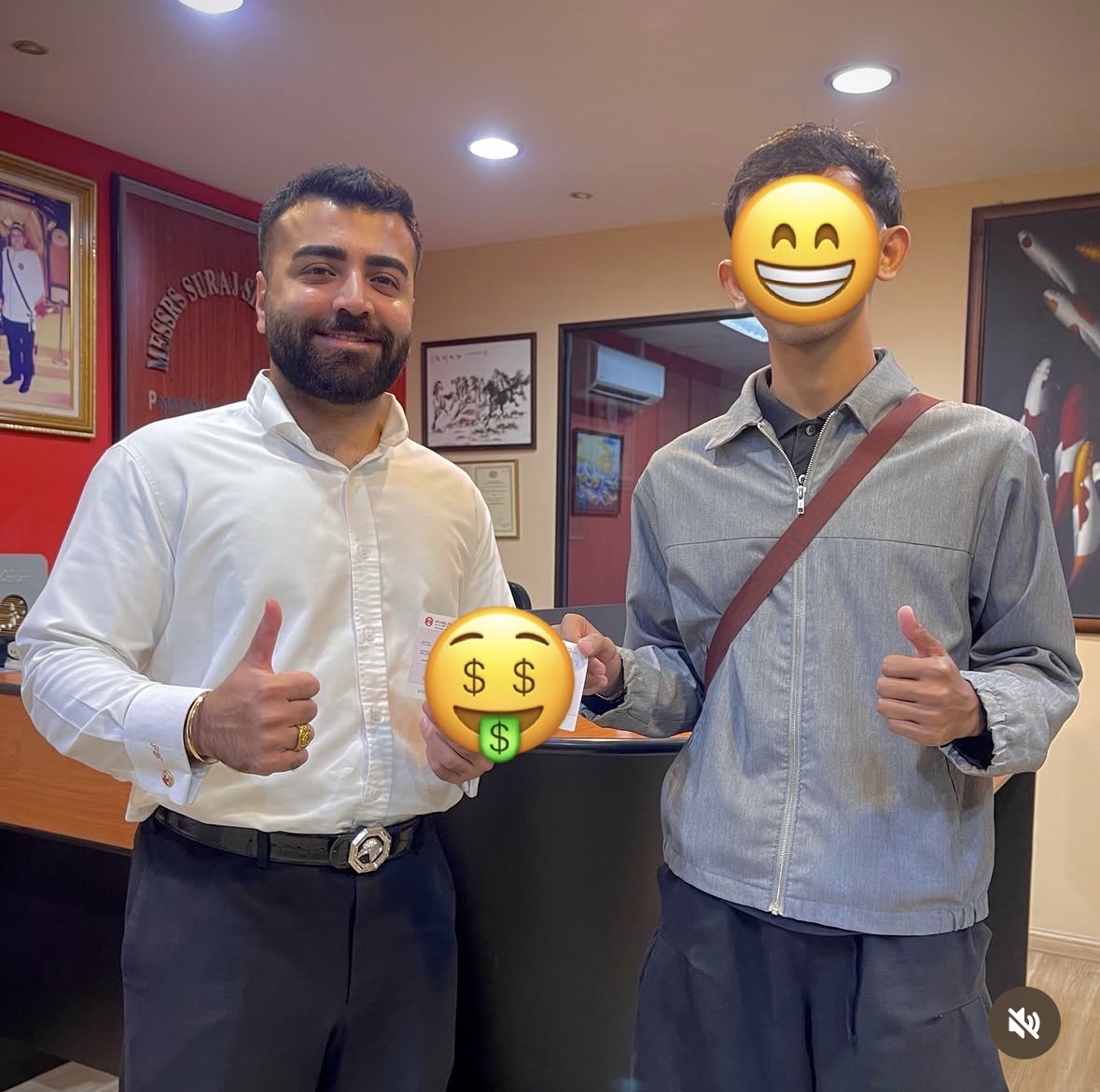 Client receiving settlement cheque at Peguam Rohan's office